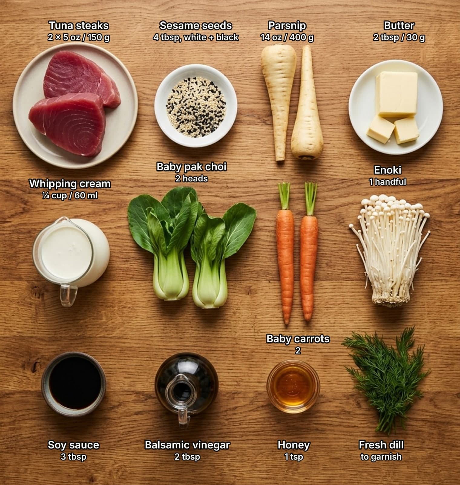 Ingredients for sesame-crusted tuna steak with parsnip purée laid out overhead on a wooden kitchen counter and labelled with quantities: two raw ruby-red tuna steaks on a pale plate, a dish of mixed white and black sesame seeds, two whole parsnips and a plate of butter with cut cubes across the top; a glass jug of cream, two heads of baby pak choi, two whole carrots and a cluster of enoki mushrooms in the middle; a dish of soy sauce, a cruet of balsamic vinegar, a small bowl of honey and a bunch of fresh dill below.